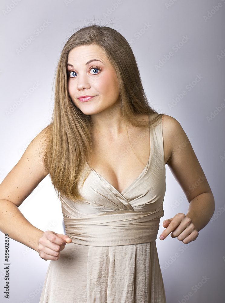 Cheerful young girl in surprise Cheerful young girl in surprise