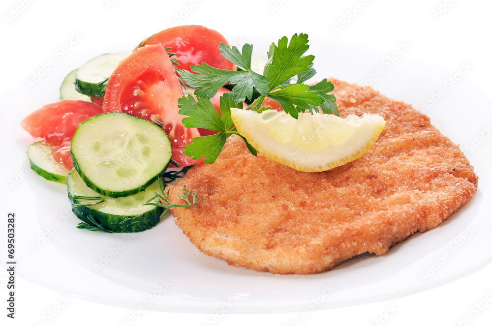 Chicken schnitzel with vegetables and herb