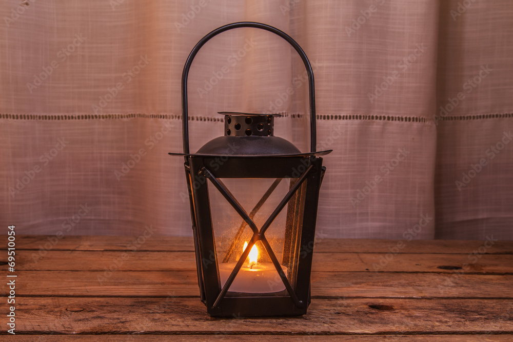 Lantern on wooden table