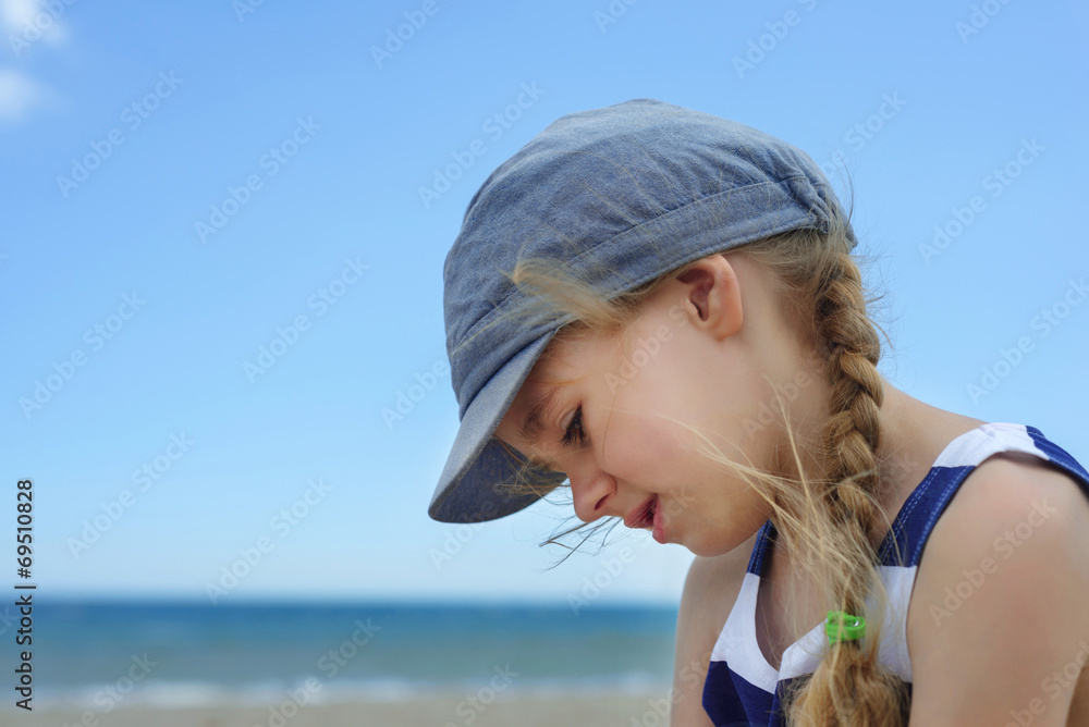 Portrait of beautiful little girl in denim hat Portrait of beautiful little girl in denim hat
