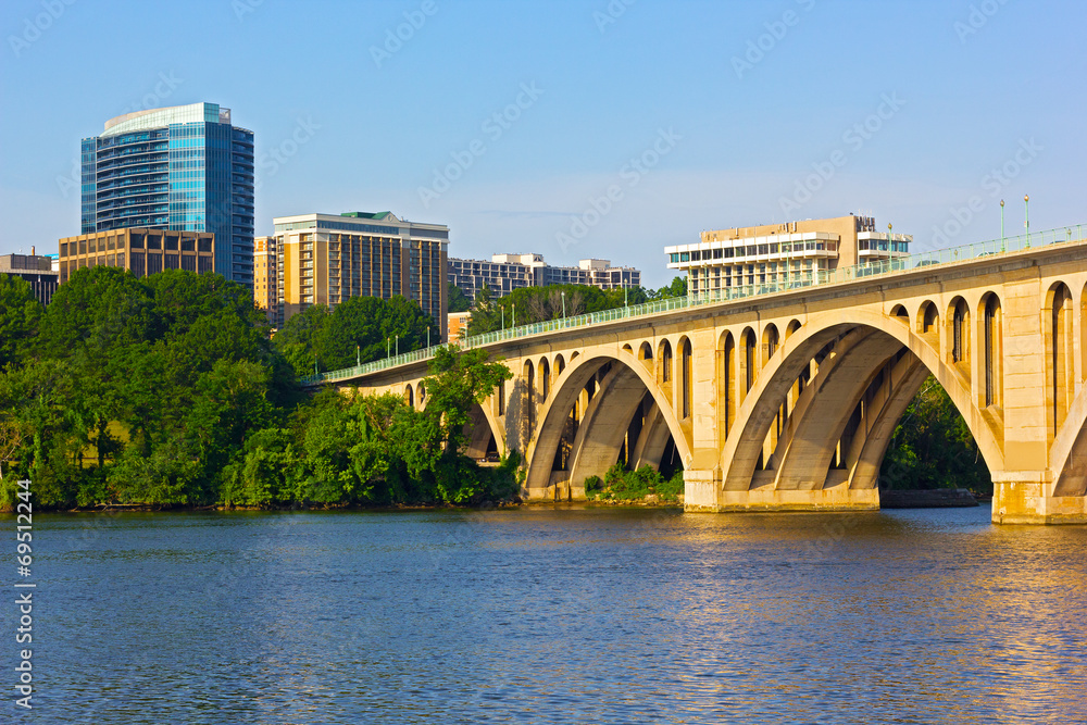 Key Bridge in Washington DC with office building on background