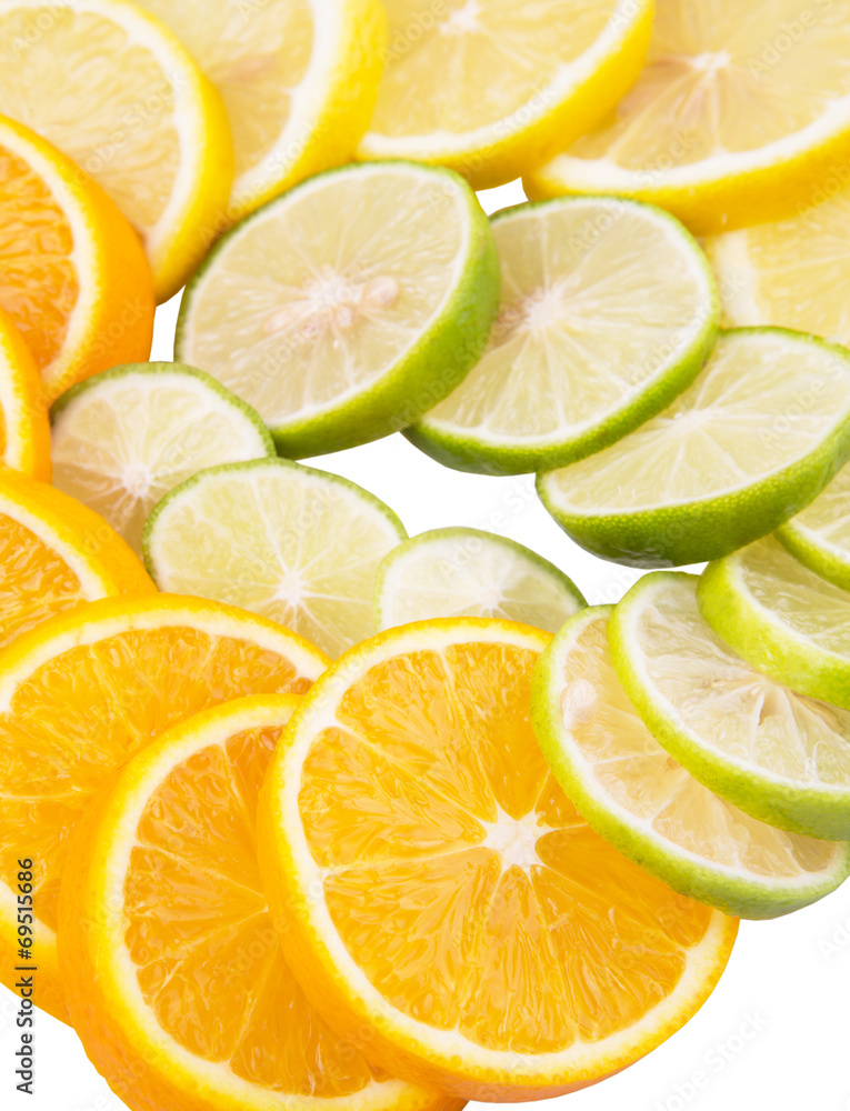 Lime, lemon and orange layer slices over white background Lime, lemon and orange layer slices over white background