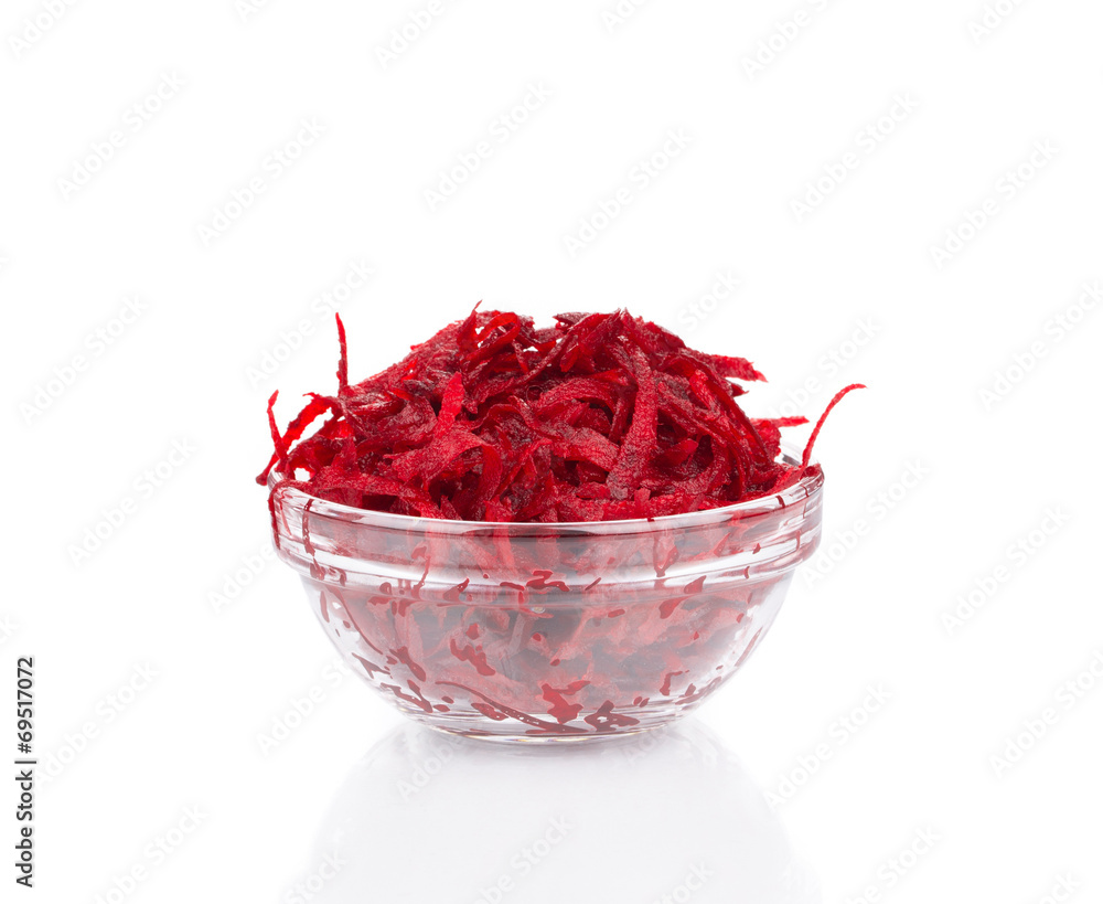 Fototapeta premium Glass bowl full with grated beets.