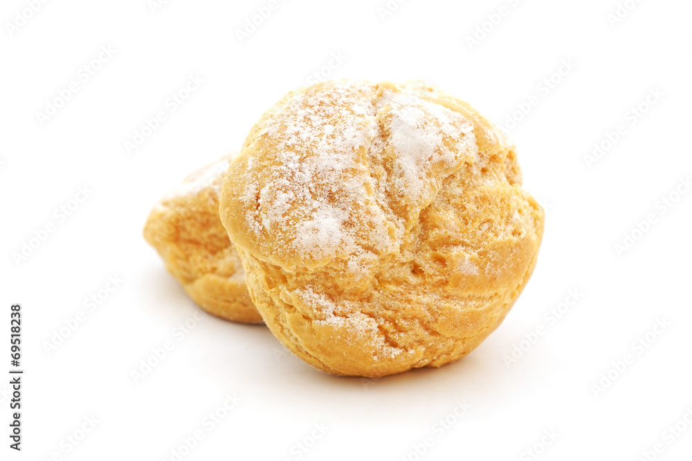 baked bread with icing on white background baked bread with icing on white background