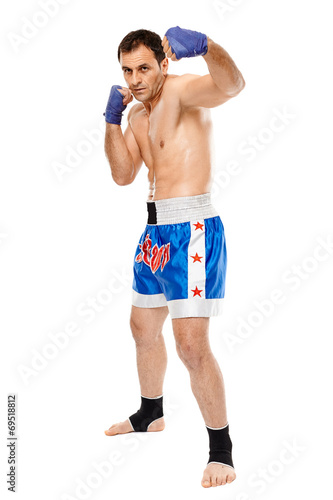 Kickbox fighter executing a punch © Xalanx