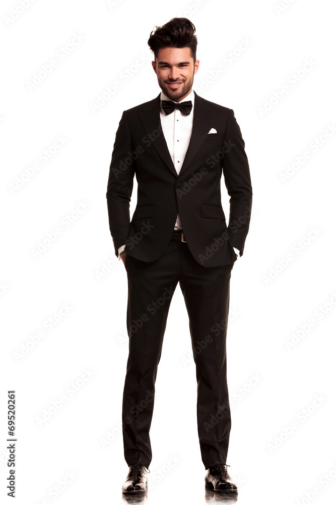 smiling young man wearing tuxedo smiling young man wearing tuxedo
