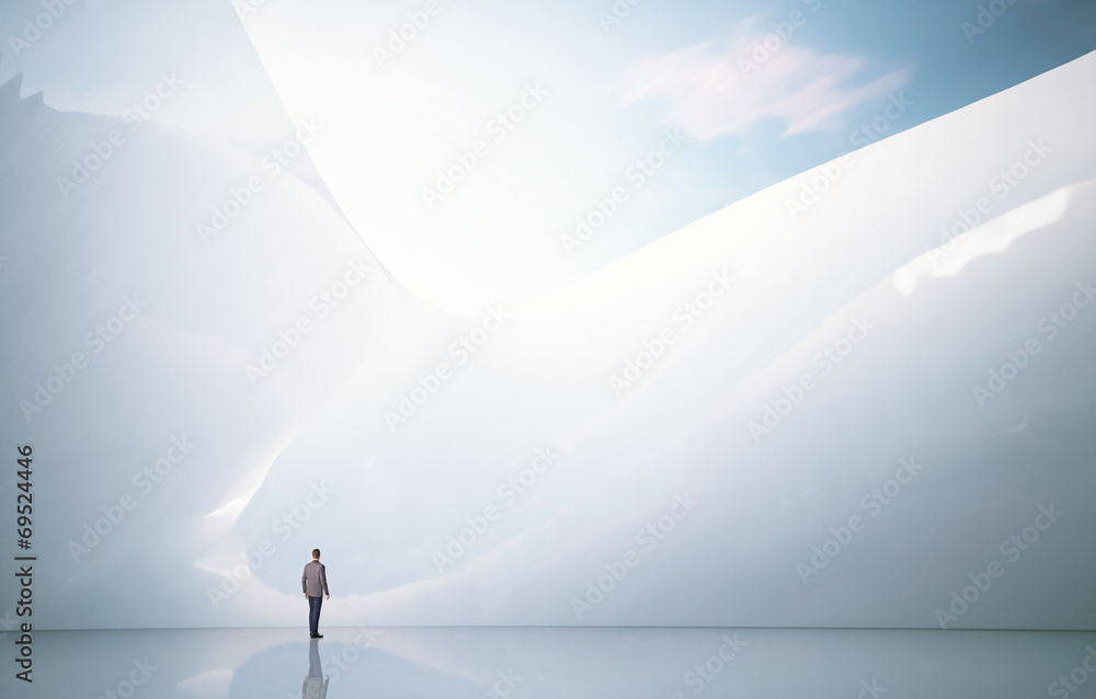 Business man on a abstract architectural background Business man on a abstract architectural background