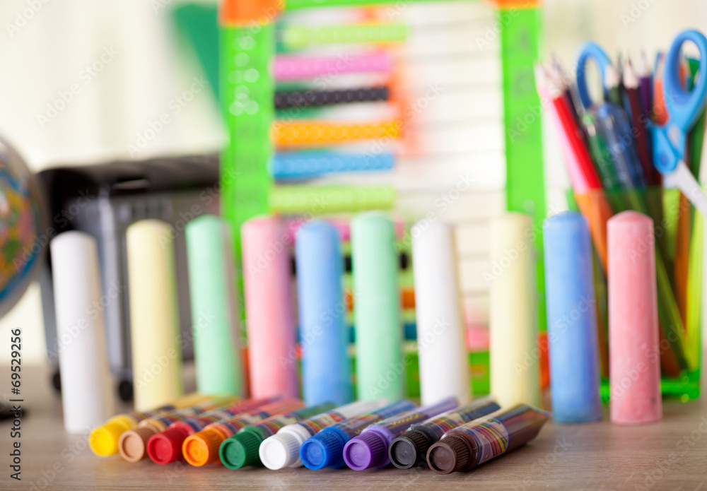 Fototapeta Full background of a colorful assortment of school supplies