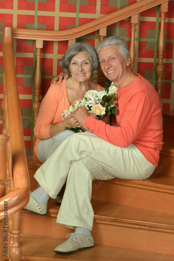 Mature couple on stairs