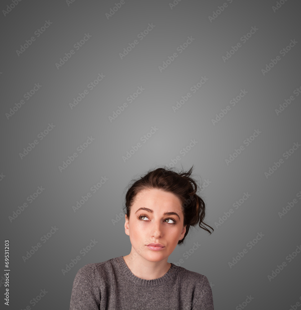 Thoughtful young woman gesturing with copy space Thoughtful young woman gesturing with copy space