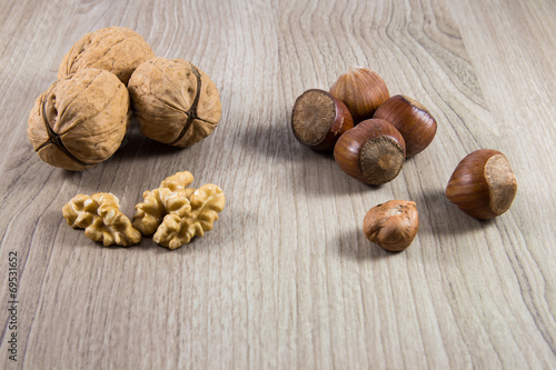 Mix of nuts on a wooden background