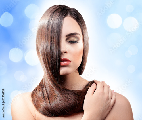 Beautiful young woman with ...