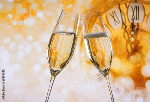 New Year or Christmas at midnight with champagne flutes