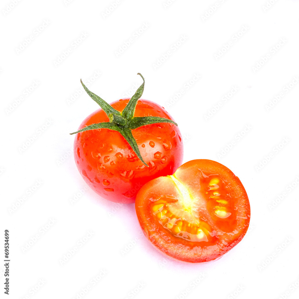 Fresh Tomato with droplet on white background Fresh Tomato with droplet on white background