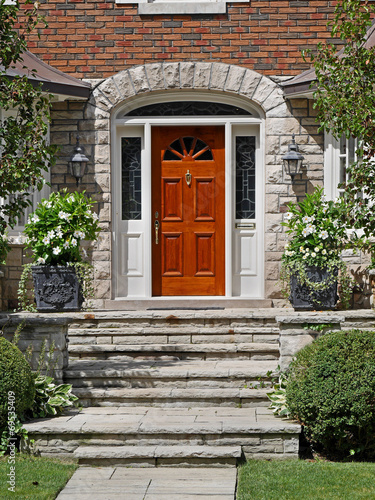 house front door with flagstone steps