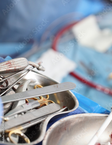 Surgery. Symbol in the form of bloody tools photo