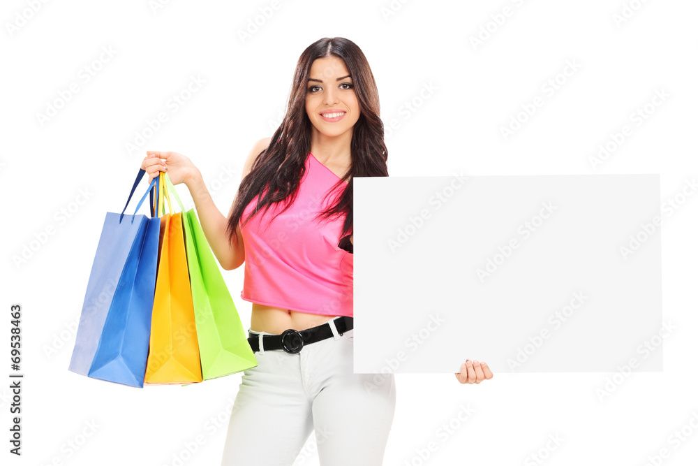 Woman holding shopping bags and a banner Woman holding shopping bags and a banner
