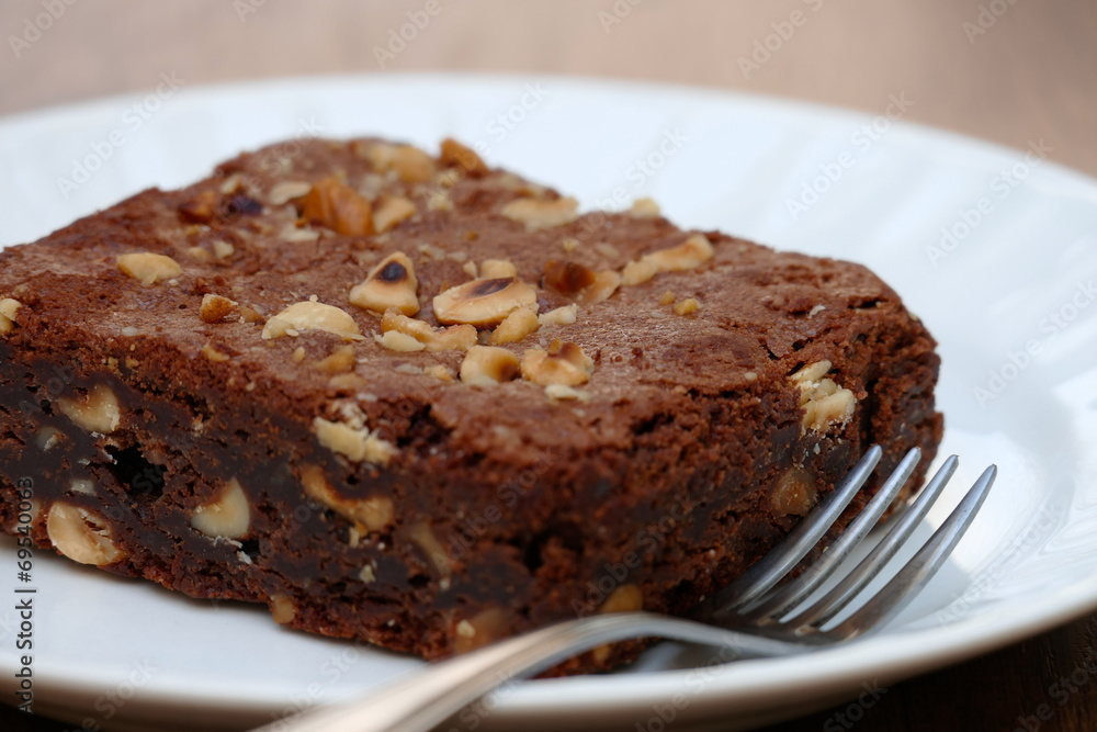 Brownie with Hazelnuts in Plate Brownie with Hazelnuts in Plate