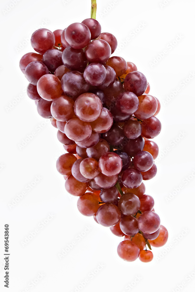Fresh red grapes isolated on white background. Fresh red grapes isolated on white background.