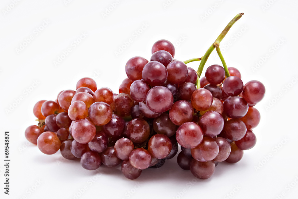 Fresh red grapes isolated on white background.