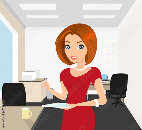 Pretty woman in the office holds a tablet pc in her hand
