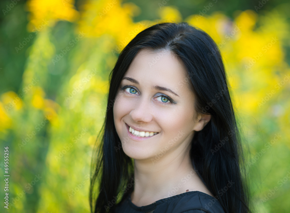 Woman smiling happy on sunny summer or spring day. Woman smiling happy on sunny summer or spring day.