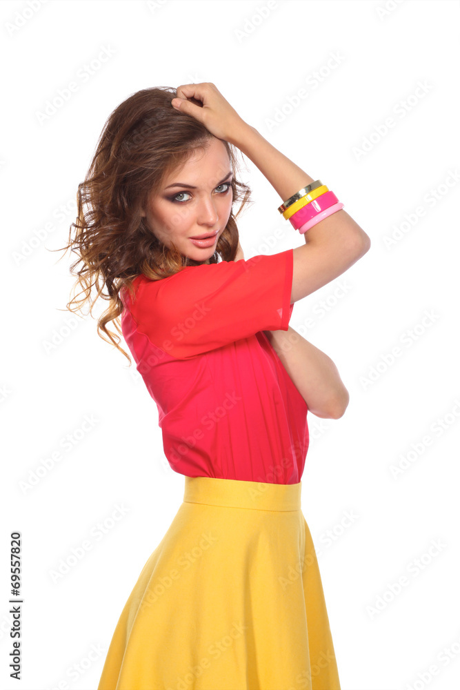 Beautiful woman with curly hair wearing a red jacket, isolated Beautiful woman with curly hair wearing a red jacket, isolated