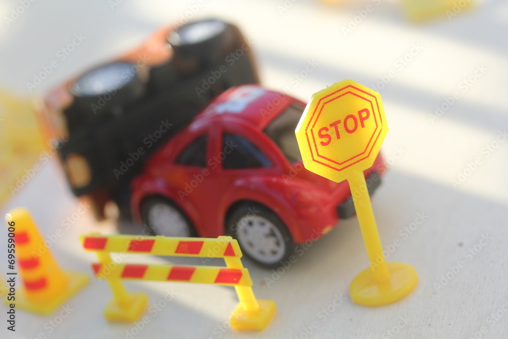 Fototapeta premium car Accident zone cordoned off with a yellow stop sign post