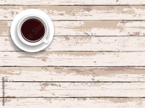 Coffee on a wooden table. Wooden background