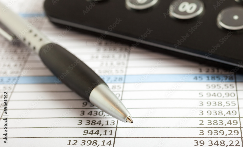 Pen over a business document Pen over a business document
