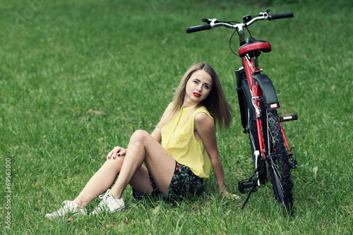 beautiful young girl and bike