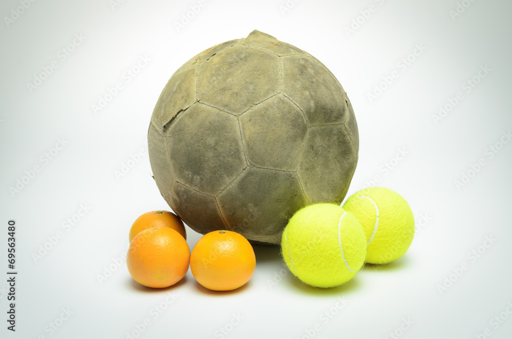 Fototapeta premium football with tennis ball and oranges isolated