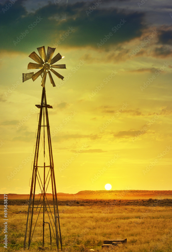 African farm land and windmill