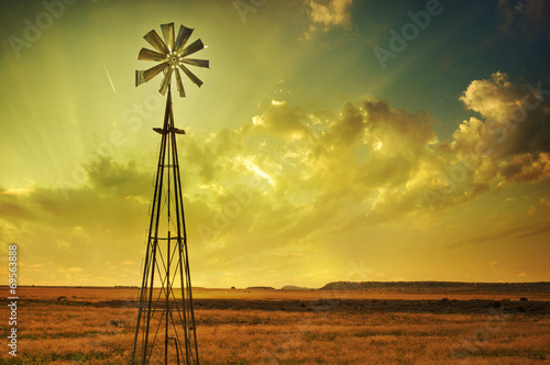 Canvas Print Windmill in African savannah farm land