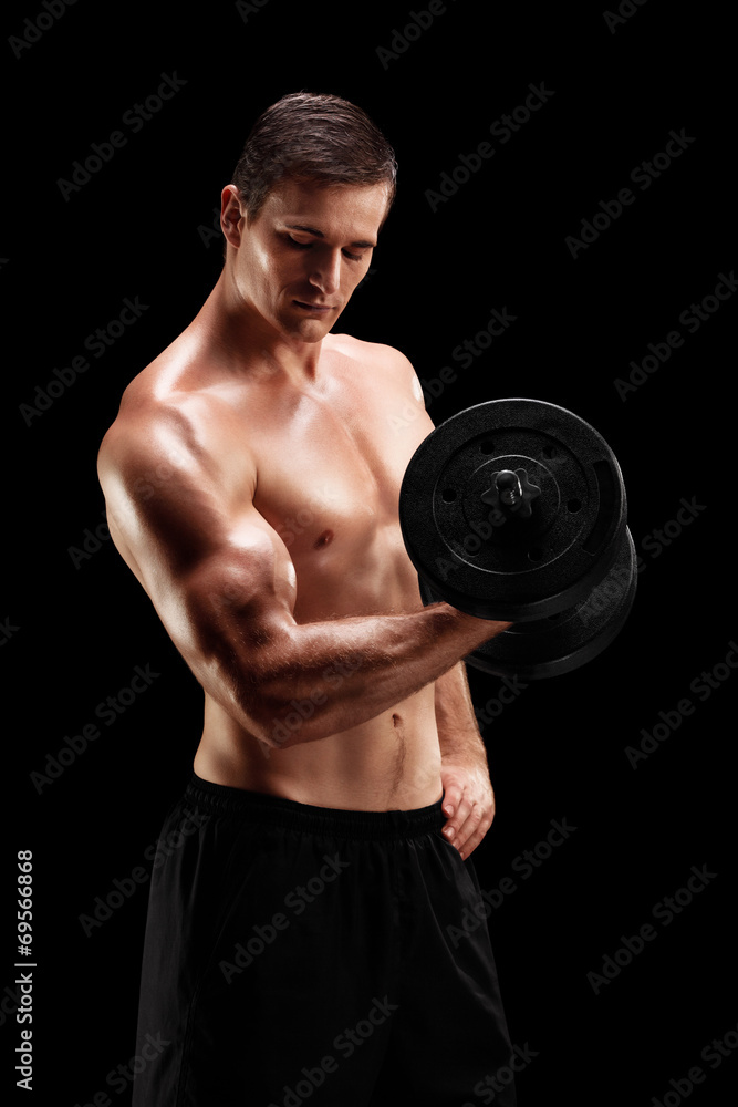 Handsome bodybuilder exercising with a barbell Handsome bodybuilder exercising with a barbell