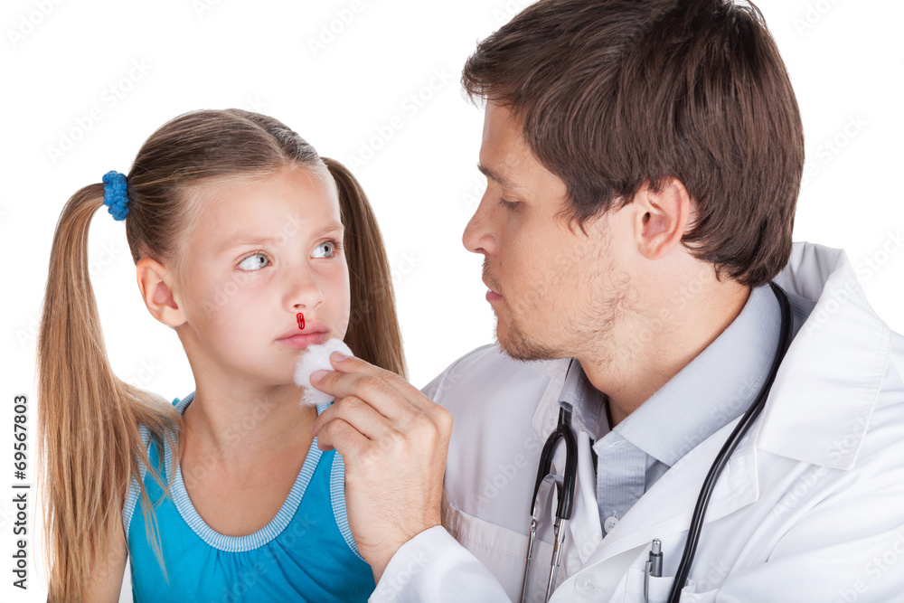 Cute girl looking at doctor with stethoscope. Cute girl looking at doctor with stethoscope.