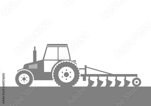 Grey tractor on field
