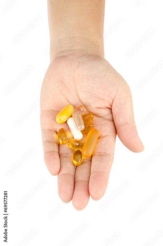 Vitamin in woman's hand Vitamin in woman's hand