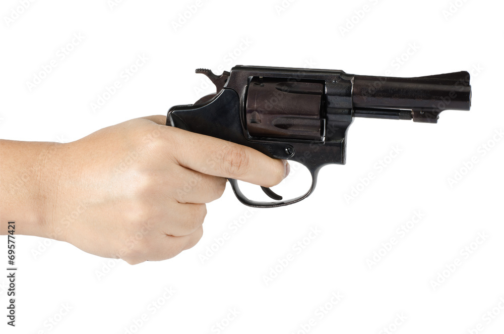 Woman's hand with gun Woman's hand with gun