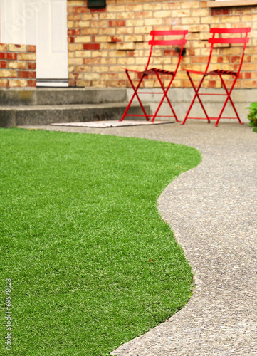 Way with perfect grass landscaping with artificial grass