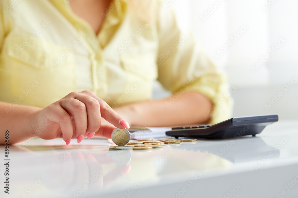Female hands with coins euros Female hands with coins euros