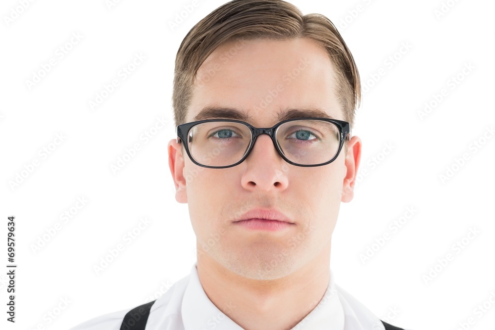 Nerdy hipster looking at camera