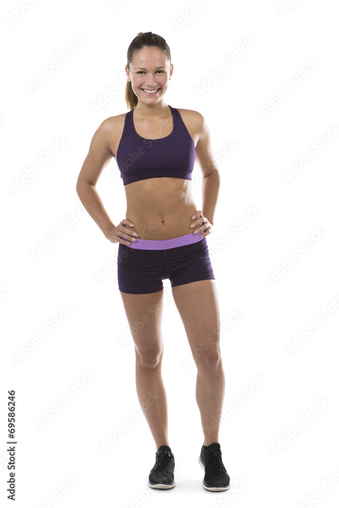 Fit muscular young woman in sportswear Fit muscular young woman in sportswear