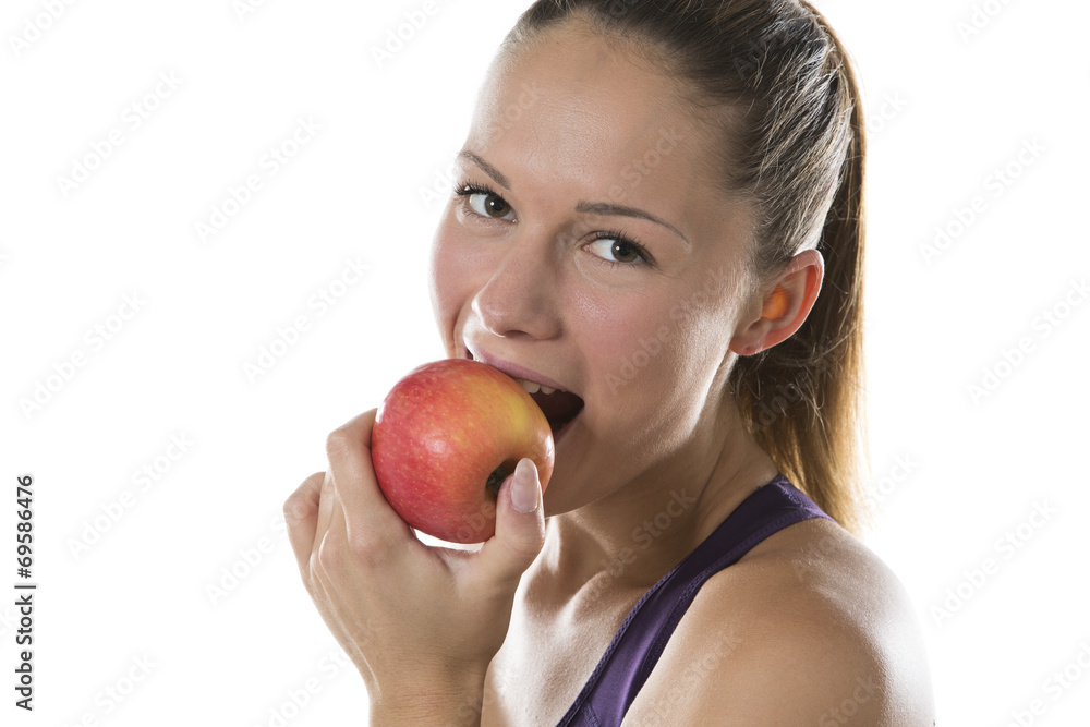 Healthy young woman enjoying a juicy fresh apple Healthy young woman enjoying a juicy fresh apple