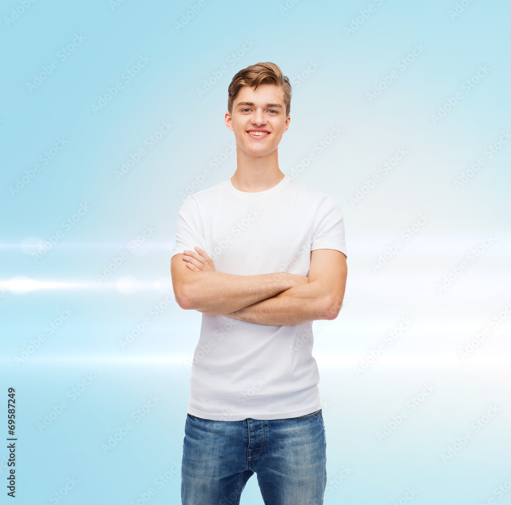 smiling young man in blank white t-shirt smiling young man in blank white t-shirt