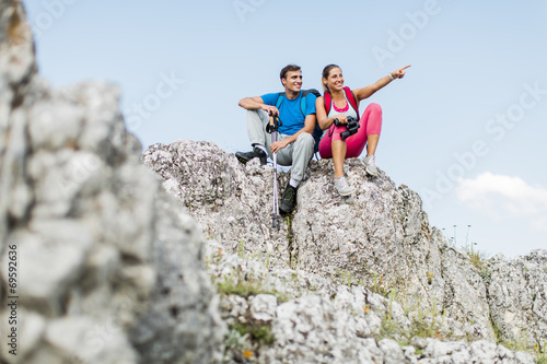 Young couple hiking on the ...