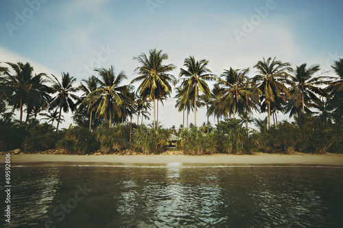 Beautiful sandy beach with palm trees