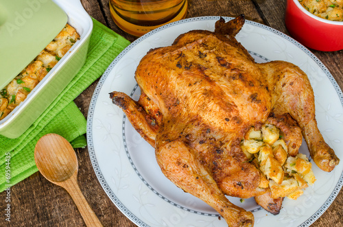 Grilled chicken stuffed with czech beer photo