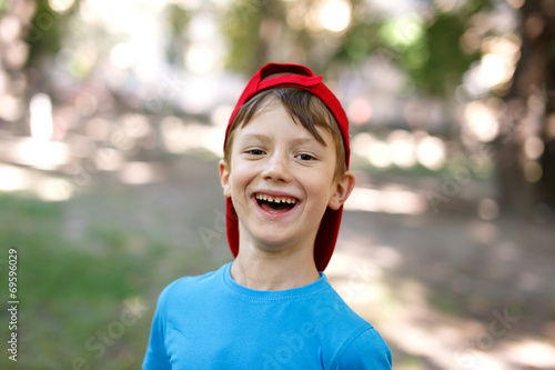 Little boy laughing outdoor