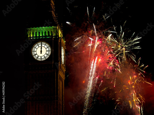 Photography Midnight with Big Ben and real fireworks. New Year.